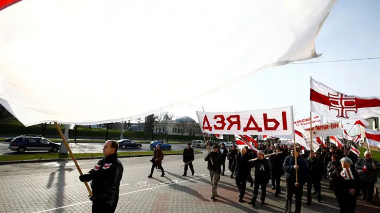 People march from Minsk to Kuropaty mass grave in commemoration of victims