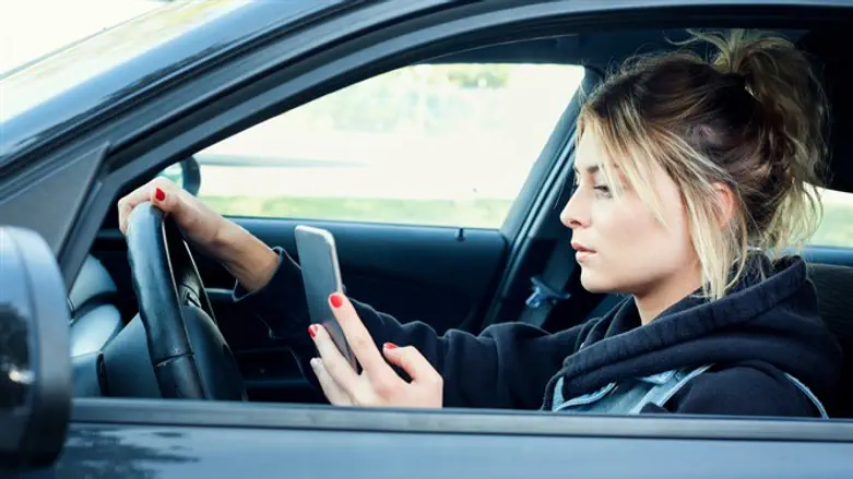 Woman texts while driving