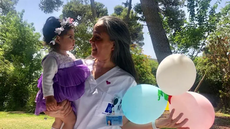 Hadassah Esther and her midwife Estee at her first birthday party