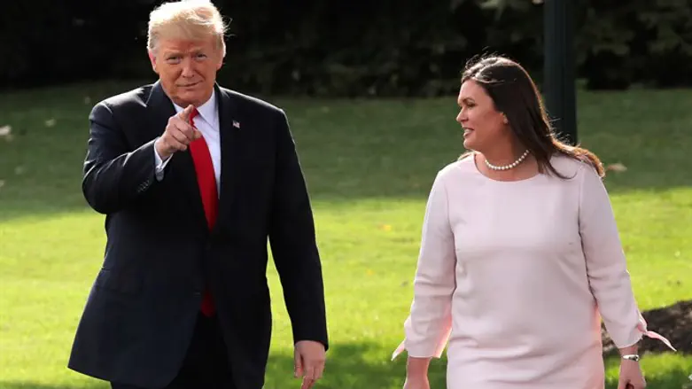 Sarah Huckabee Sanders with President Trump