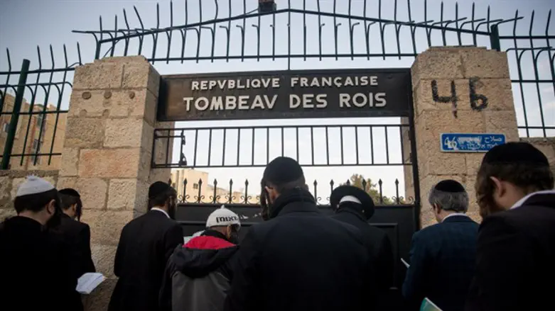 Haredi men at entrance to Tomb of the Kings in Jerusalem