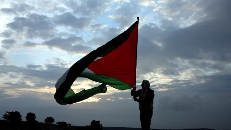 Foreign flag raised over Jewish land