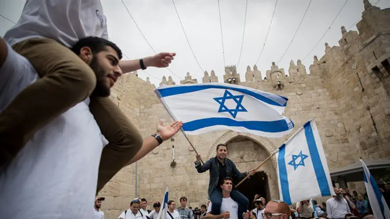 Jerusalem Day dance through Damascus Gate on way to Western Wall