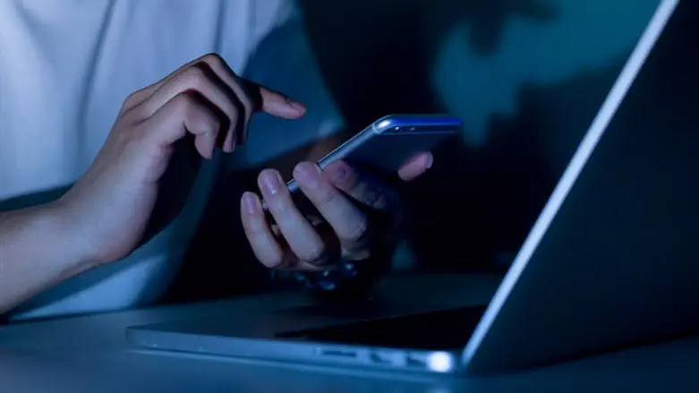 Messaging on laptop, cell phone