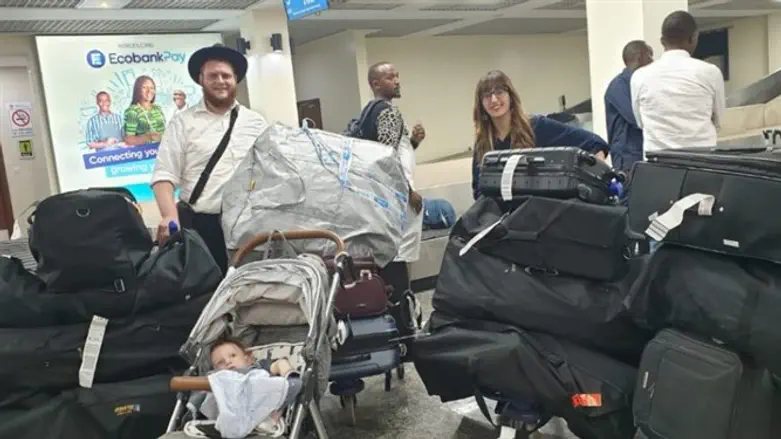 Rabbi Chaim and Dina Bar Sella and Shneur Zalman arrive in Kigali, Rwanda