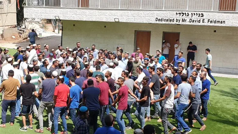 Singing and dancing at dedication of new building at Yeshivat Sderot