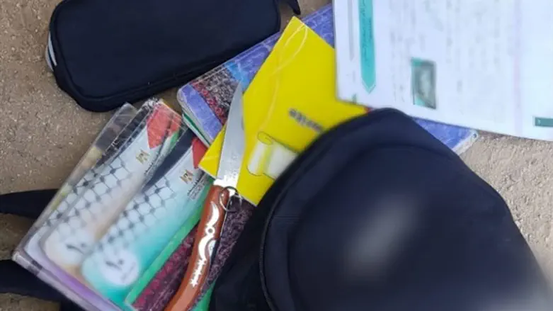 Knife caught in backpack