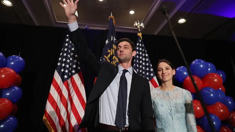 Jon Ossoff standing alongside his fiance, Alisha Kramer