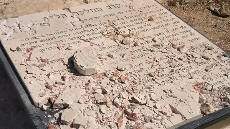 Desecrated memorial to slain convoy members