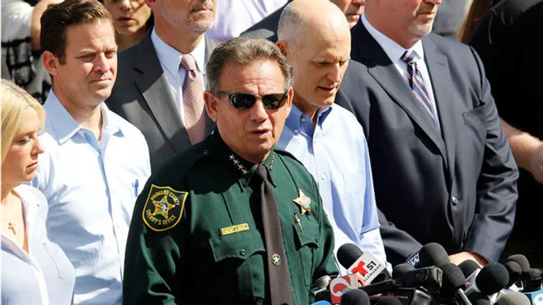 Sheriff Scott Israel addresses the news media outside Marjory Stoneman Douglas H