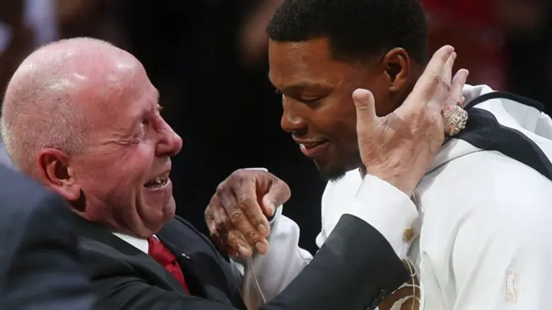 Toronto Raptors co-owner Larry Tanenbaum with Kyle Lowry