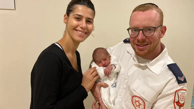 Yissachar Weiss and Adva Minsharov, with her new baby