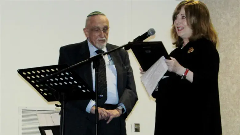 Marcia Abramov presenting award to Dr. Gerstenfeld