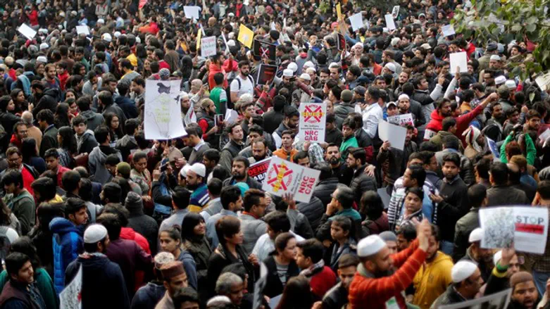 In New Delhi, India, citizens protest against new citizenship law