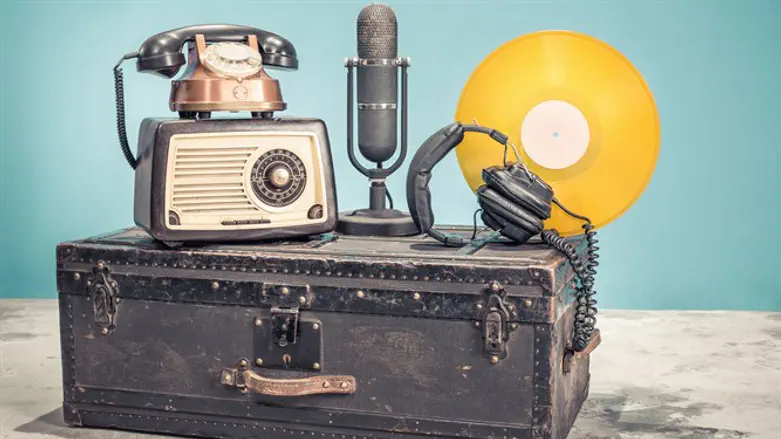 Retro radio from 60s, old copper telephone, studio microphone from 50s