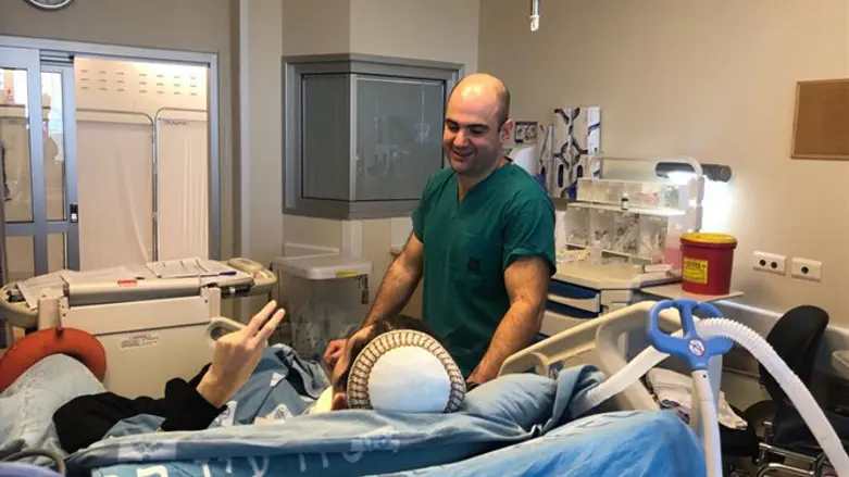 Nachum Nevies with the doctor who saved his life