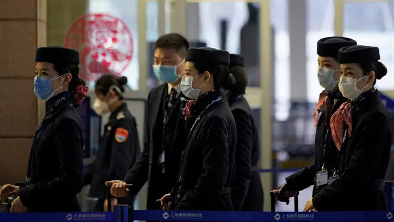 דיילות בשדה התעופה פודונג בשנגחאי