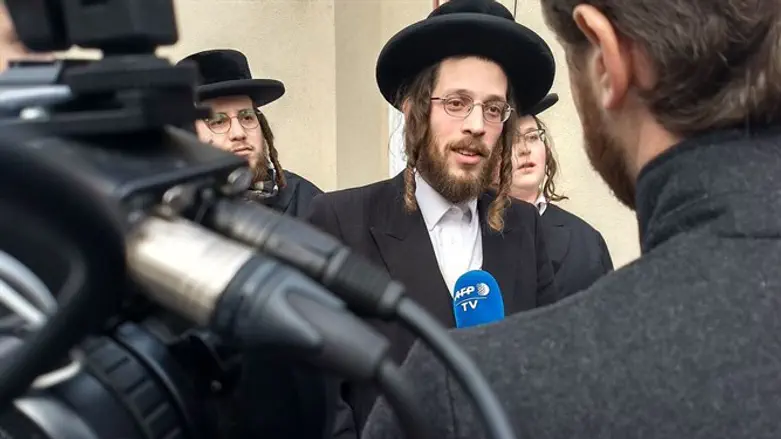 Joseph Gluck speaks to reporters