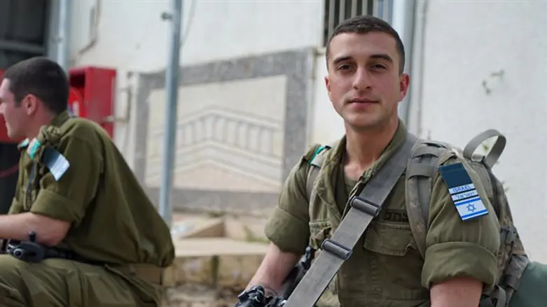 Soldier assisting in enforcement of health directives