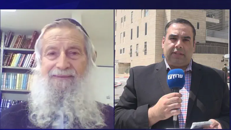 Rabbi Melamed (L)