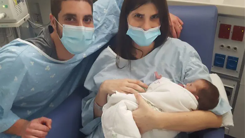 Liraz and Gal Carmeli, with their son