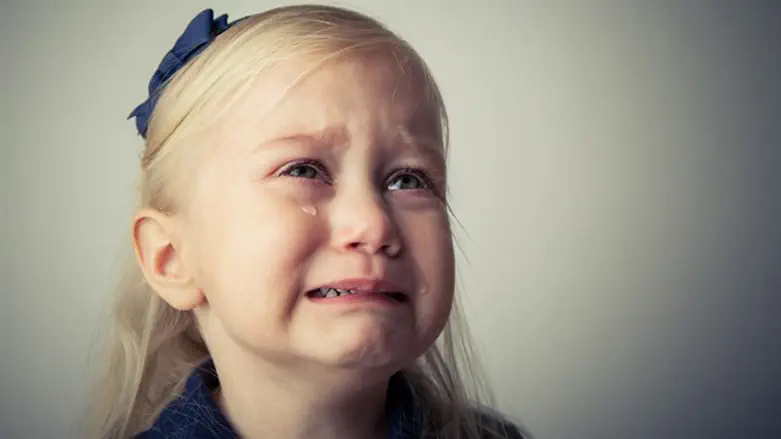 Crying girl (illustrative)