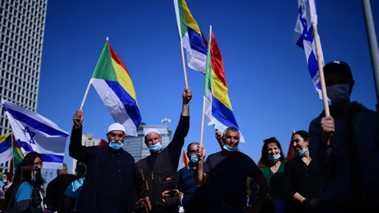 Members of the Druze community protest in Tel Aviv on May 10, 2020