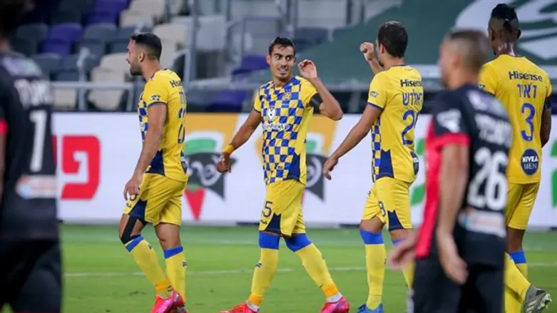 שחקני מכבי חוגגים הערב בלי מגע