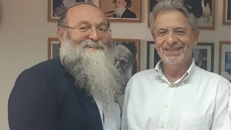 ראש מכון פוע"ה הרב מנחם בורשטין וראש ארגון איל"ה פרופ' אדריאן שולמן. ארכיון