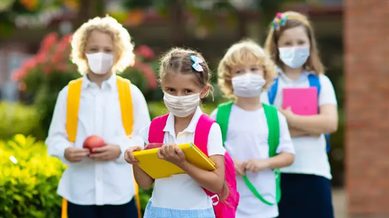 Schoolchildren wearing masks