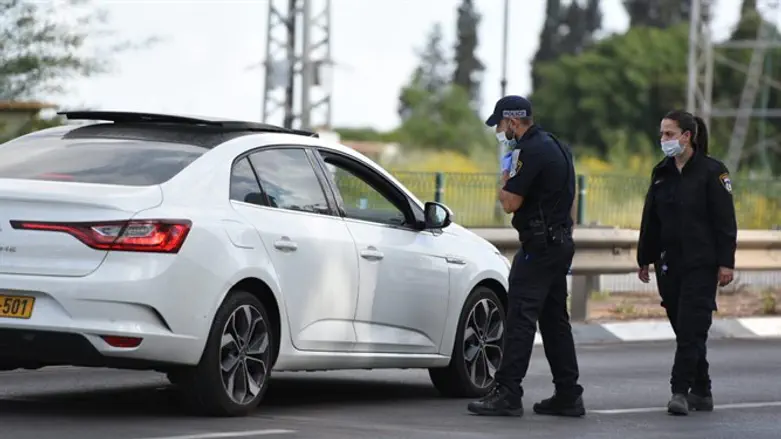 Police officers enforce restrictions