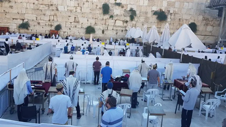 Morning prayers at the Western Wall