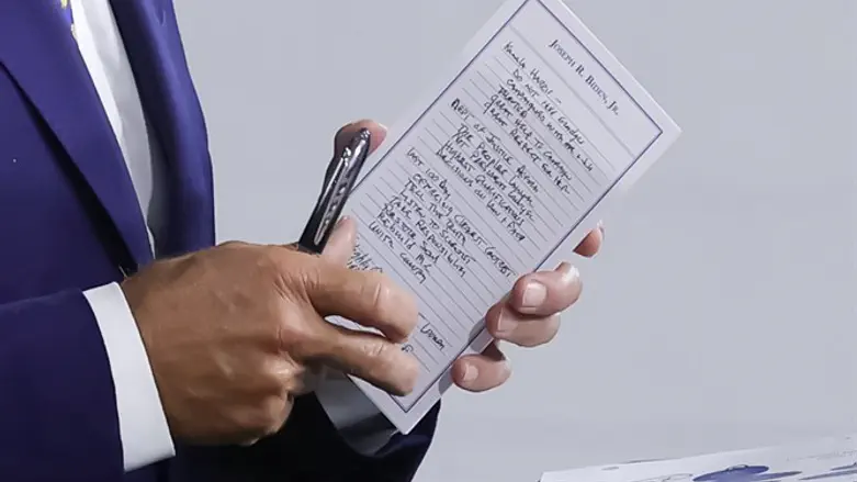 Joe Biden holds Kamala Harris talking points list
