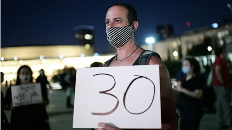 Protester at demonstration Thursday following alleged gang rape