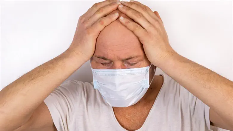 Bald man suffering from coronavirus