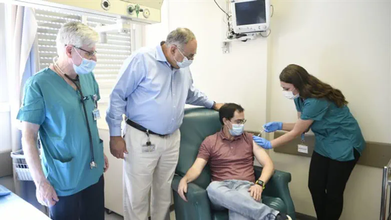 Administering the test vaccine