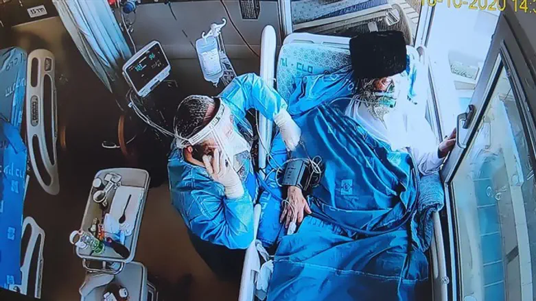 Father watches wedding from the window of his room in COVID-19 ward