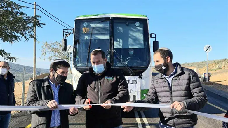 Cutting inauguration ribbon