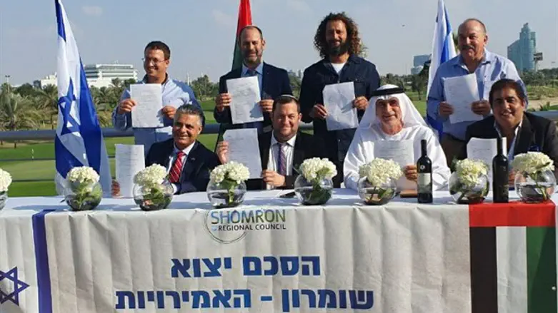 signing deal in Dubai